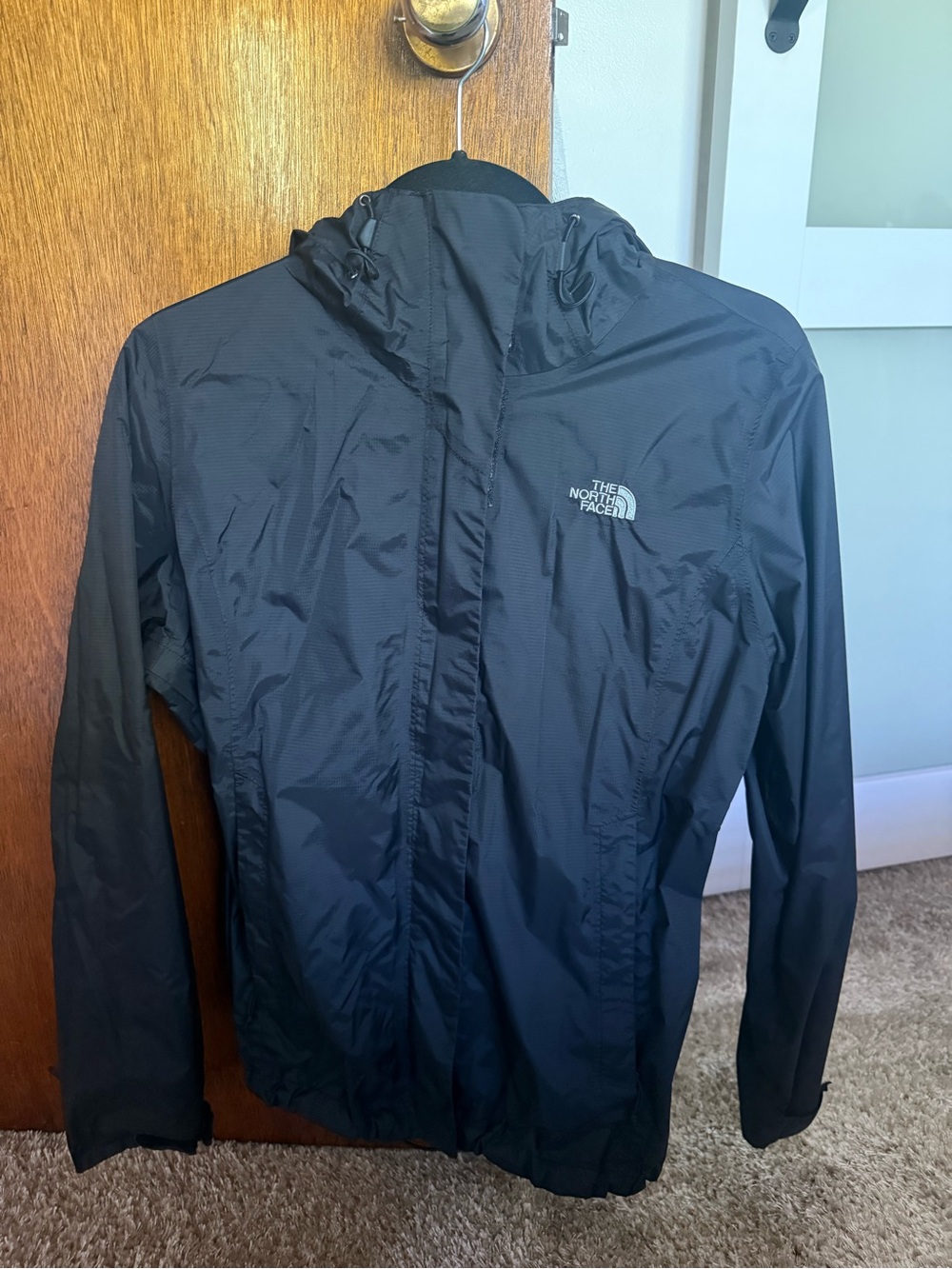 The North Face women’s Black Hooded Lightweight Jacket
